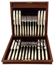 George III Cased Set of Crested Silver & Mother of Pearl Dessert Knives & Forks for Twelve, circa 1810.