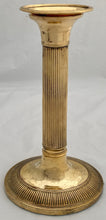 Early 19th Century Set of Four Gilded Old Sheffield Plate Candlesticks.
