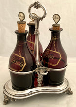 William IV Silver Decanter Stand & Three Amethyst Glass Decanters. London 1832 The Barnards. 25 troy ounces.