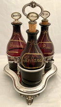 William IV Silver Decanter Stand & Three Amethyst Glass Decanters. London 1832 The Barnards. 25 troy ounces.