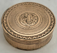 An Early 19th Century Gilt Metal Snuff Box With Triumphal Regalia.
