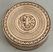 An Early 19th Century Gilt Metal Snuff Box With Triumphal Regalia.