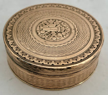 An Early 19th Century Gilt Metal Snuff Box With Triumphal Regalia.