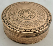 An Early 19th Century Gilt Metal Snuff Box With Triumphal Regalia.