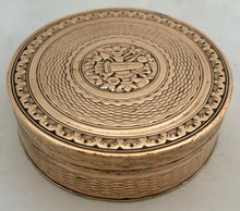 An Early 19th Century Gilt Metal Snuff Box With Triumphal Regalia.