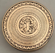 An Early 19th Century Gilt Metal Snuff Box With Triumphal Regalia.