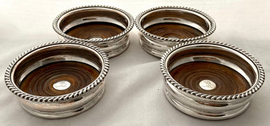 Georgian Set of Four Old Sheffield Plate Crested Wine Coasters, circa 1820.
