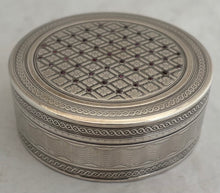 Continental Circular, Gemstone Inset, Silver Snuff Box. London Import 1905, Louis Desoutter. 2.8 troy ounces.