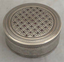 Continental Circular, Gemstone Inset, Silver Snuff Box. London Import 1905, Louis Desoutter. 2.8 troy ounces.