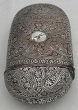 An Anglo Indian Silver Plate on Copper Cigar Case, circa 1890 - 1910.