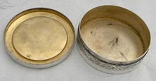 French Silvered Circular Table Snuff Box Engraved with 'La Mort de L'Oiseau', after Jean-Baptiste Greuze. Circa 1900.