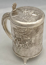 A Northern European Style Silver Plated Lidded Tankard with Relief Detail.