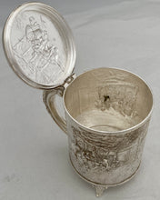 A Northern European Style Silver Plated Lidded Tankard with Relief Detail.