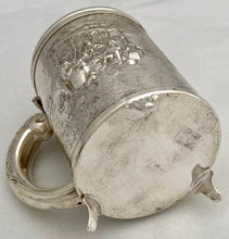 A Northern European Style Silver Plated Lidded Tankard with Relief Detail.