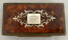 19th Century Horn Table Snuff Box with Tortoiseshell Cover and Ivory Inlay.