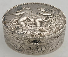 Continental White Metal Putti Relief Snuff Box with Gilded Interior. 1.9 troy ounces.