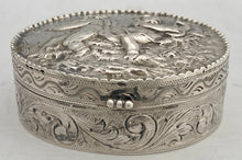 Continental White Metal Putti Relief Snuff Box with Gilded Interior. 1.9 troy ounces.