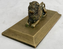 A Regency Period Desk Weight, Cast as a Recumbent Lion, circa 1820.