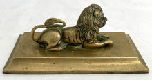 A Regency Period Desk Weight, Cast as a Recumbent Lion, circa 1820.