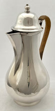Edwardian Silver Hot Water Jug. London 1906 Goldsmiths & Silversmiths Co. 13.9 troy ounces.
