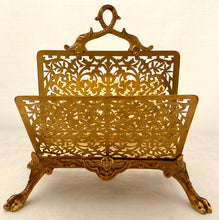 Gilt Metal Correspondence Stand on Lion Paw Feet with Dolphin Handle.