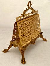 Gilt Metal Correspondence Stand on Lion Paw Feet with Dolphin Handle.