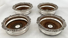 Georgian, George IV, Four Crested Old Sheffield Plate Bottle Coasters. Circa 1820 - 1830.
