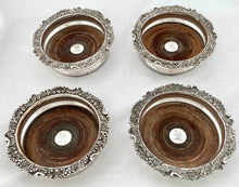 Georgian, George IV, Four Crested Old Sheffield Plate Bottle Coasters. Circa 1820 - 1830.