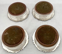 Georgian, George IV, Four Crested Old Sheffield Plate Bottle Coasters. Circa 1820 - 1830.