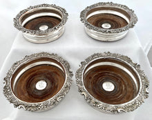 Georgian, George IV, Four Crested Old Sheffield Plate Bottle Coasters. Circa 1820 - 1830.