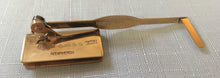 Asprey 9 carat gold cased page marker. London 1929 Asprey & Co. Ltd. 7.3 grams.