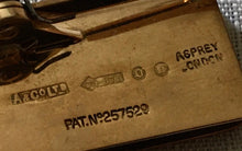 Asprey 9 carat gold cased page marker. London 1929 Asprey & Co. Ltd. 7.3 grams.