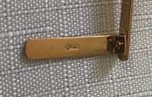 Asprey 9 carat gold cased page marker. London 1929 Asprey & Co. Ltd. 7.3 grams.