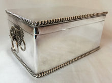 Goldsmiths and Silversmiths silver plated tea caddy box with lion mask handles.