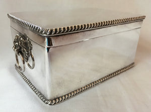 Goldsmiths and Silversmiths silver plated tea caddy box with lion mask handles.