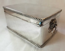 Goldsmiths and Silversmiths silver plated tea caddy box with lion mask handles.