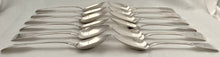 Georgian, George IV, Twelve Crested Irish Silver Tablespoons. Dublin 1825-28 William Cummins. 30 troy ounces.