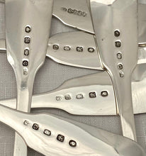 Georgian, George IV, Twelve Crested Irish Silver Tablespoons. Dublin 1825-28 William Cummins. 30 troy ounces.