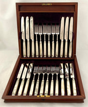 George III Cased Set of Crested Silver & Mother of Pearl Dessert Knives & Forks for Twelve, circa 1810.