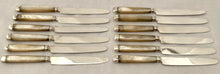 George III Cased Set of Crested Silver & Mother of Pearl Dessert Knives & Forks for Twelve, circa 1810.