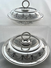 A Pair of Silver Plated Circular Entree Dishes & Covers. Retailed by Asprey.