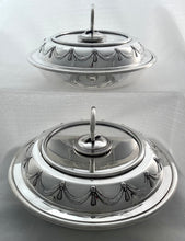 A Pair of Silver Plated Circular Entree Dishes & Covers. Retailed by Asprey.