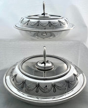 A Pair of Silver Plated Circular Entree Dishes & Covers. Retailed by Asprey.