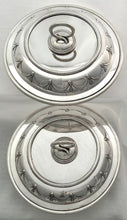 A Pair of Silver Plated Circular Entree Dishes & Covers. Retailed by Asprey.
