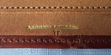 Asprey silver mounted crocodile skin wallet. London 1940 Asprey & Co. Ltd.