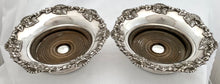Victorian Pair of Silver Plated Bottle Coasters.