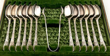 Twelve Victorian Naturalistic Double Struck Teaspoons & Sugar Tongs, circa 1880 - 1900.