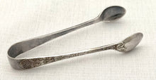 Twelve Victorian Naturalistic Double Struck Teaspoons & Sugar Tongs, circa 1880 - 1900.
