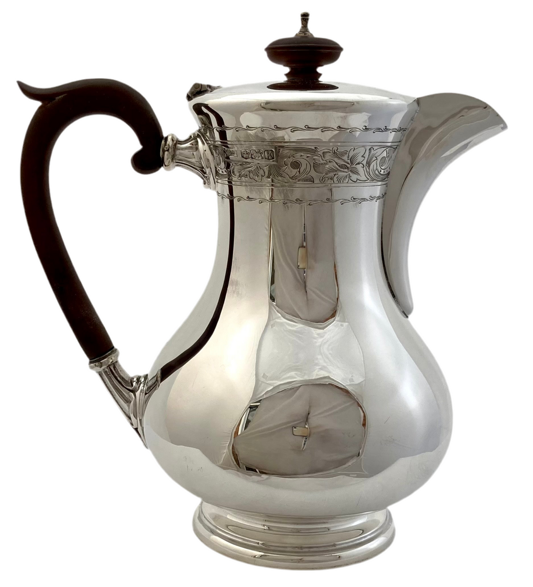 Elizabeth II Silver Hot Water Jug. Sheffield 1952 Walker & Hall. 20.3 troy ounces.