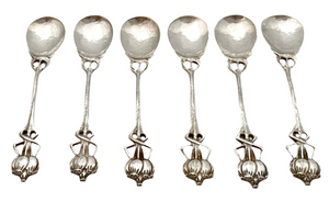 Six Arts & Crafts Coffee Spoons with Entrelac Stems & Seed Pod Terminals.